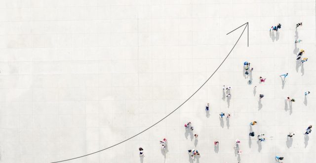 Crowd from above forming a growth graph