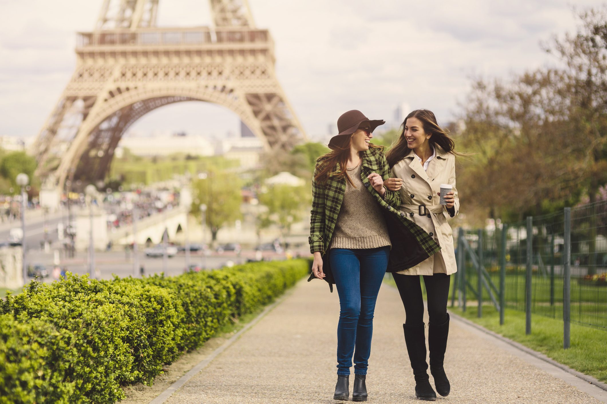 Two friends taking a walk around the Eiffel Tower in Paris